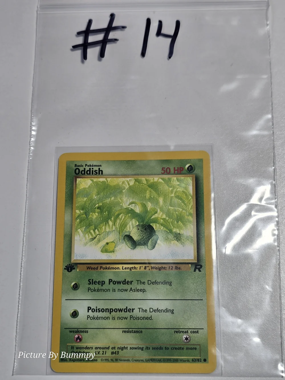 #14 Pokemon 1st Edition Oddish card (63/82) from the 2000 Team Rocket set.